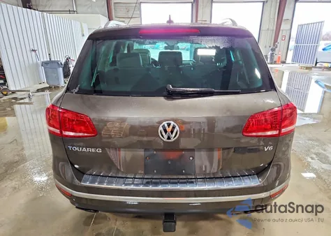 2015 Volkswagen Touareg V6 z USA, uszkodzony, nr VIN WVGEF9BP6FD007020
